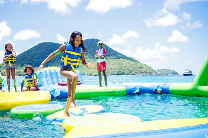 Splash Island Water Park St Lucia: Inflatable Obstacle Course at Reduit Beach photo 6