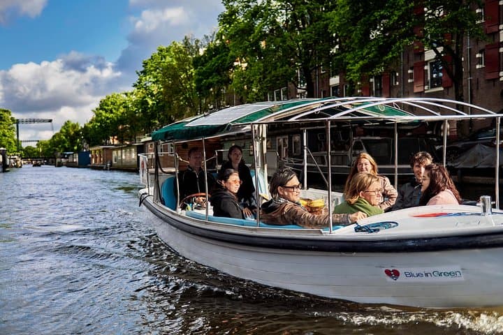 Private 2-Hour Amsterdam Canal Cruise with Live Guide & Drinks
