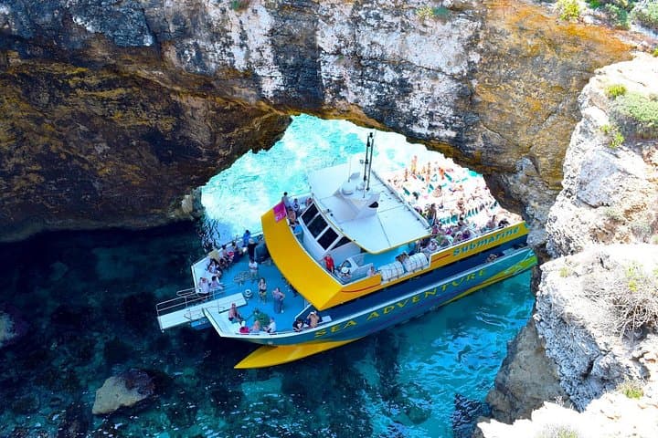 Blue Lagoon Sunset Catamaran Cruise: Evening Swim, Snorkel & Comino Caves photo 5