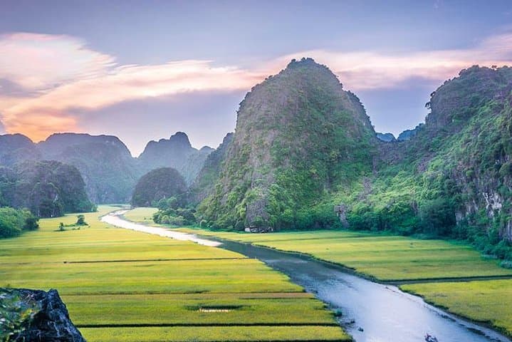 Day Trip to Trang An, Hoa Lu & Mua Cave from Hanoi — Boat Caves and Summit Views photo 4