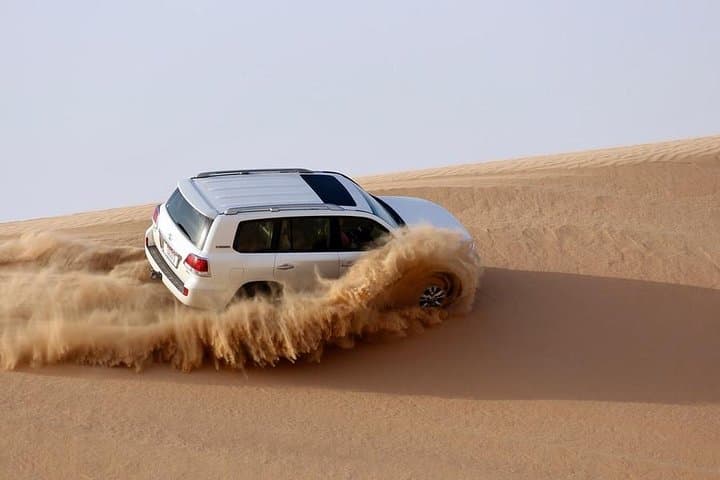 Sunrise Desert Safari Doha — Dune Bashing, Camel Rides & Sandboarding photo 2