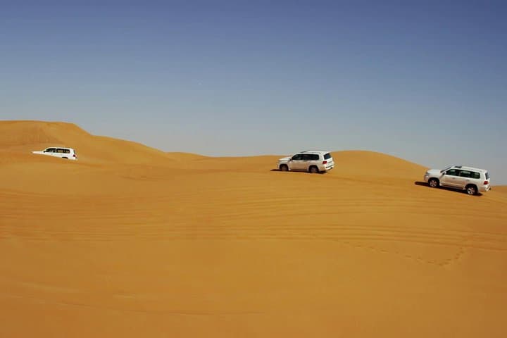 Morning Dubai Red Dunes Safari: Camel Ride, Dune Bashing & Sandboarding
