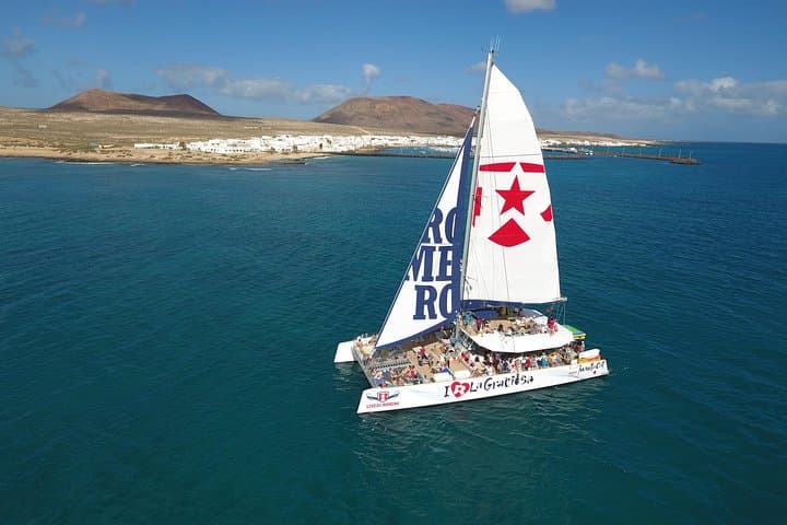 La Graciosa Catamaran Day Trip from Órzola — Swim, Kayak & Paella photo 1