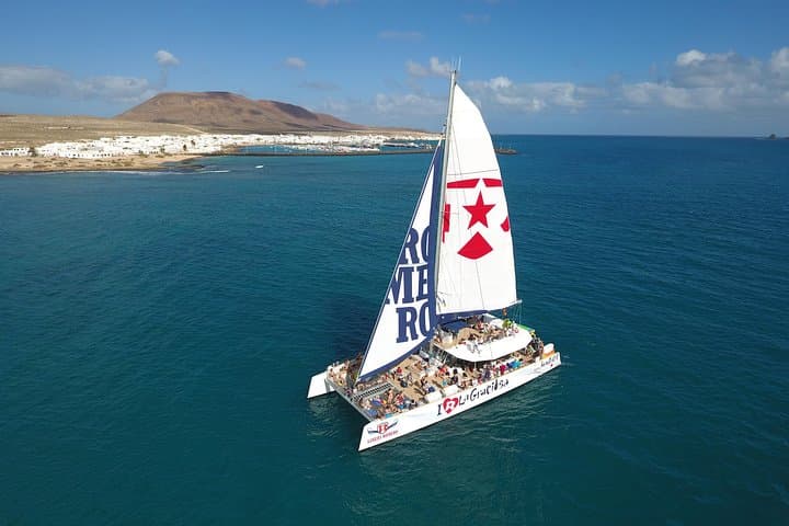 La Graciosa Catamaran Day Trip from Órzola — Swim, Kayak & Paella photo 2