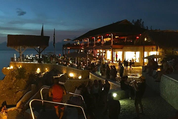 Explore Negril's Iconic Seven Mile Beach & Rick's Café