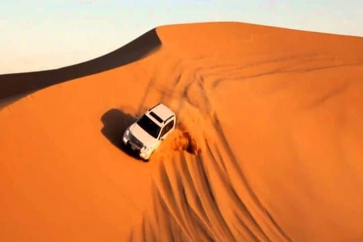 Red Dune Desert Safari Dubai: Sunset Dune Bashing, BBQ Camp & Belly Dance photo 2