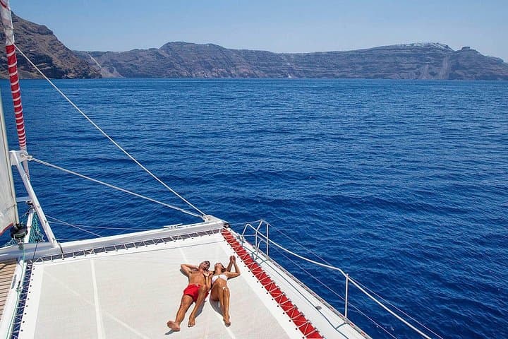Santorini Catamaran Cruise with BBQ, Open Bar & Snorkeling photo 2