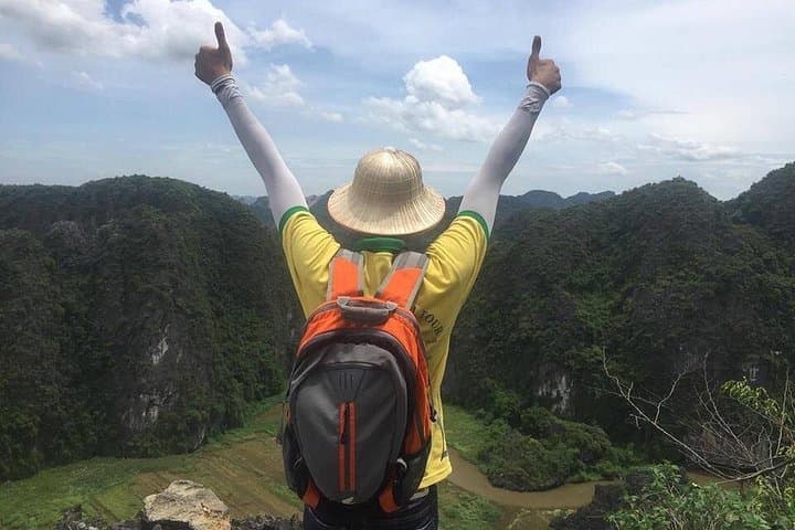 Full-Day Trang An, Hoa Lu & Mua Cave Tour — Boat Trip and Summit Views from Hanoi photo 4