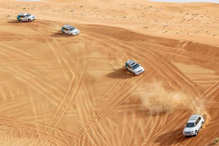 Morning Desert Safari Dubai: Sunrise Dune Bashing & Sandboarding photo 4