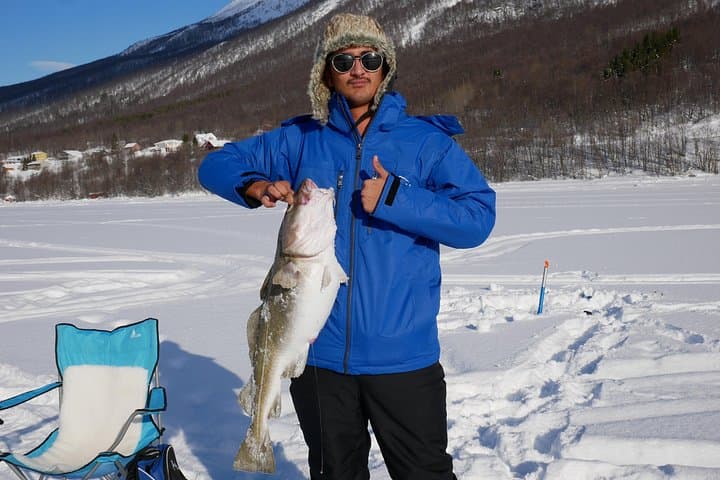 Ice Fishing on Ullsfjord: Arctic Catch & Cookout from Tromsø photo 3