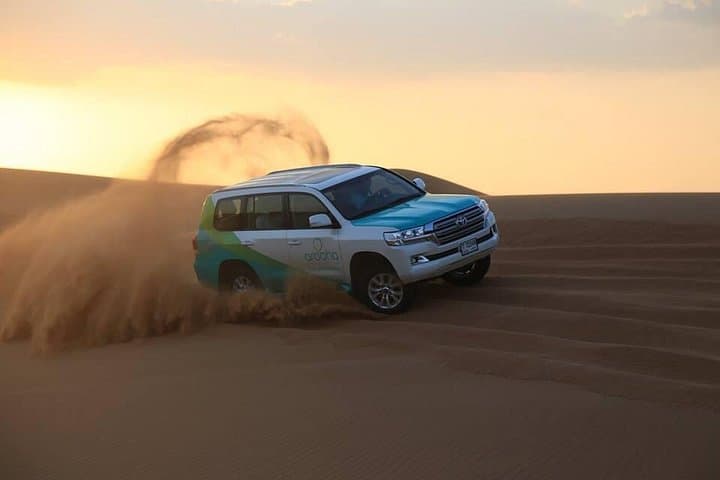Desert Sunset Champagne Private Tour in Dubai — Dune Bashing, Sandboarding & Bedouin Camp photo 3