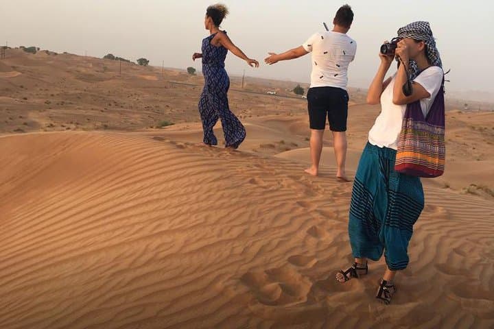 Evening Red Dunes Desert Safari in Lahbab: Dune Bashing, Sandboarding & BBQ Under the Stars photo 5