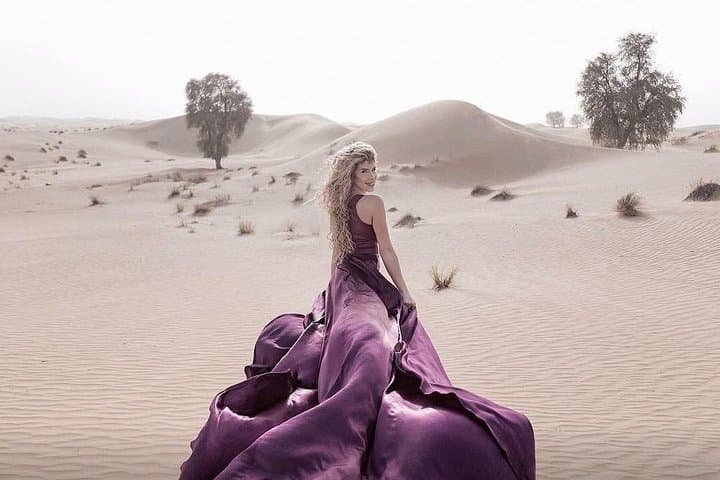 Evening Red Dunes Desert Safari in Lahbab: Dune Bashing, Sandboarding & BBQ Under the Stars photo 6