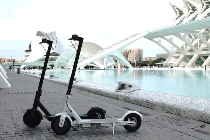 Explore Valencia by Electric Scooter: Flexible City Rentals with Helmet Included