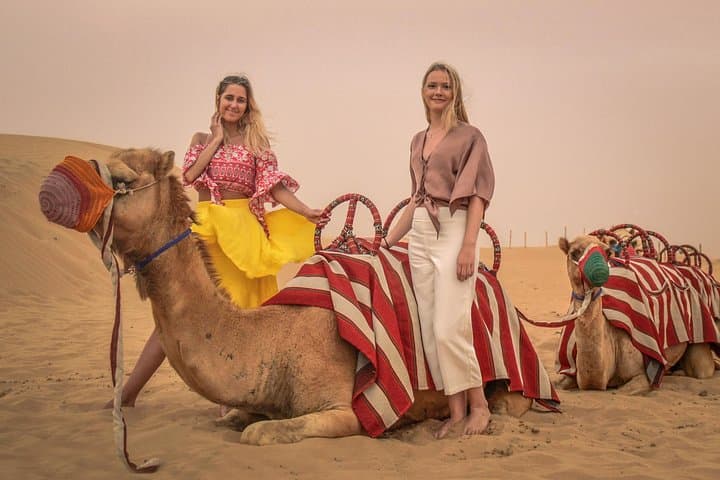 Dubai Desert Quad Bike Safari: Half-Day Quad Ride, Sandboarding & Camel Experience photo 2