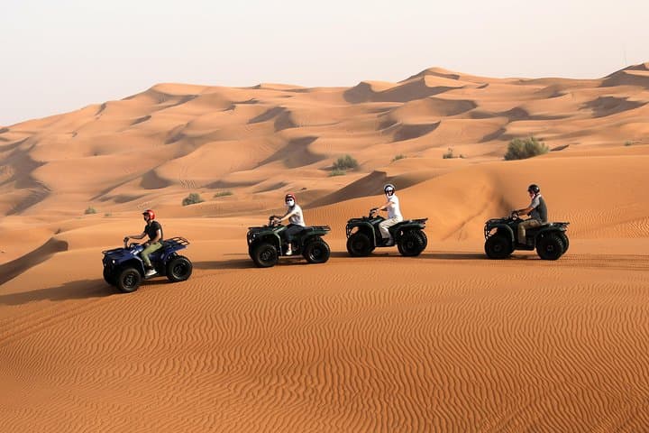 Dubai Desert Quad Bike Safari: Half-Day Quad Ride, Sandboarding & Camel Experience photo 4