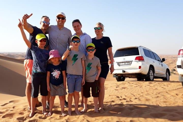 Dubai Desert Safari from Ras Al Khaimah: Dune Bashing, Camel Ride & BBQ Experience