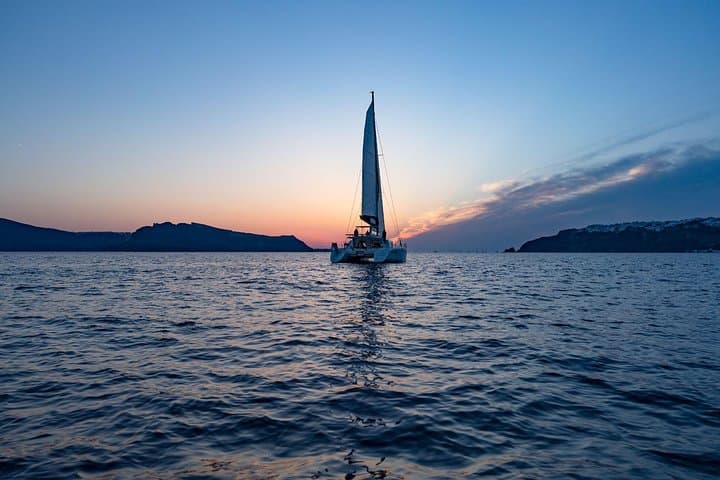 Santorini Sunset Cruise: BBQ, Hot Springs & Red Beach Swim photo 4