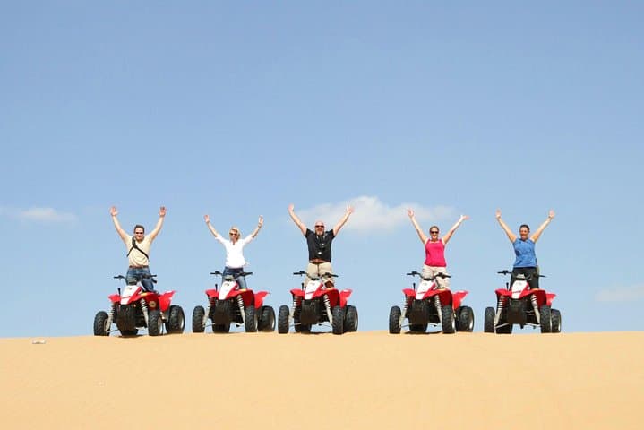 Dubai Red Dunes Quad Bike Safari: Sandboarding, Camel Rides & BBQ Under the Stars