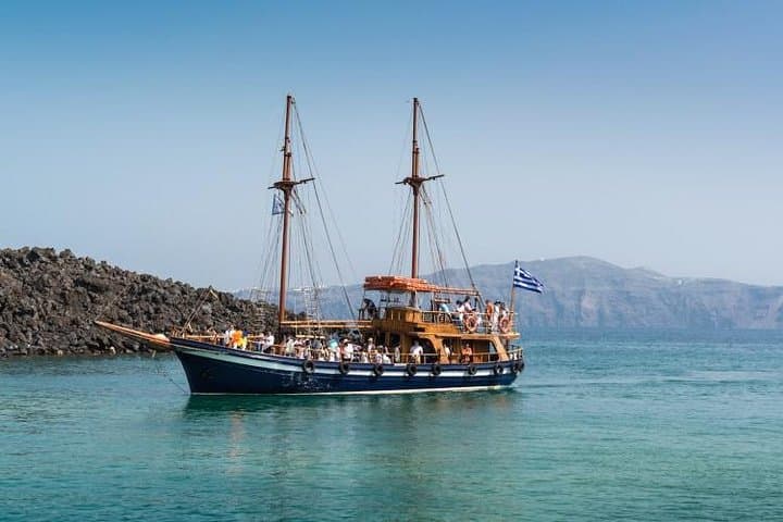 Santorini Volcano Tour: Boat to Nea Kameni & Hot Springs from Fira photo 2