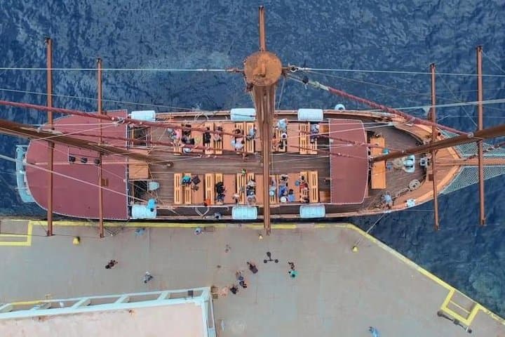 Santorini Volcano Tour: Boat to Nea Kameni & Hot Springs from Fira photo 3