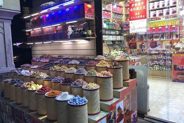 Bargains and Aromas: A Walking Tour of Dubai's Gold, Spice, and Textile Souks photo 1