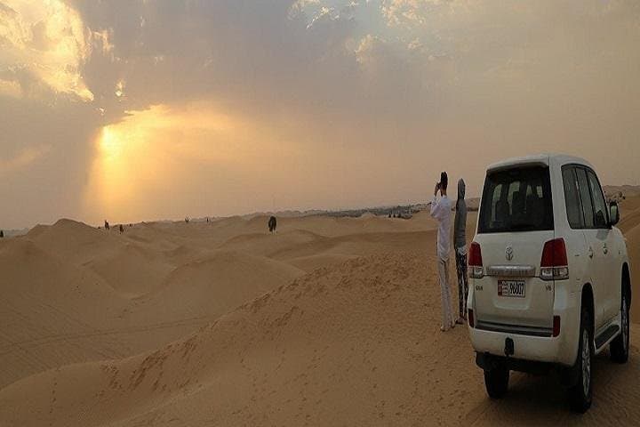 Sunrise Desert Safari from Abu Dhabi: Dune Bashing, Camel Farm & Sandboarding photo 2