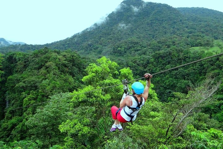Soar Above La Fortuna Waterfall: Arenal 12 Zipline Cables Adventure photo 5