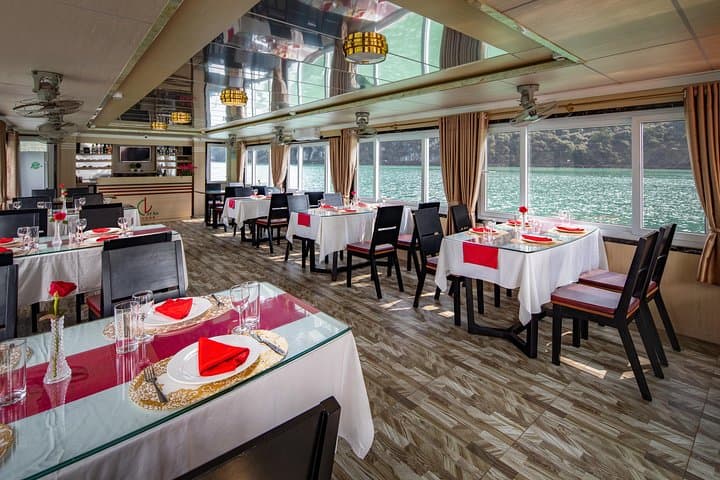 Luxury Day Cruise Halong Bay & Lan Ha Bay — Dark Cave, Swimming & Cooking Class photo 2