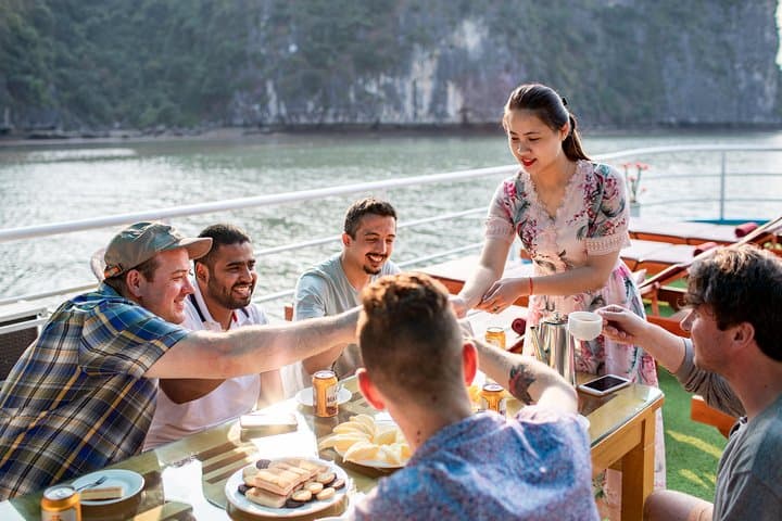 Luxury Day Cruise Halong Bay & Lan Ha Bay — Dark Cave, Swimming & Cooking Class photo 5