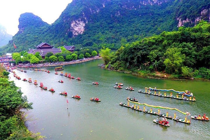 Trang An & Bai Dinh Day Tour from Hanoi: Boat Caves, Biking & Mua Cave Viewpoint photo 1