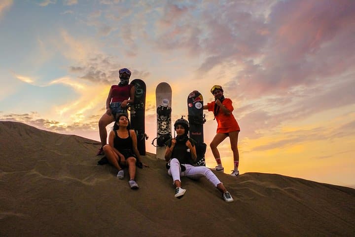 Thrill of Sandboarding in Northern Peru: Glide Down Dunes with Panoramic Coastal Views photo 2