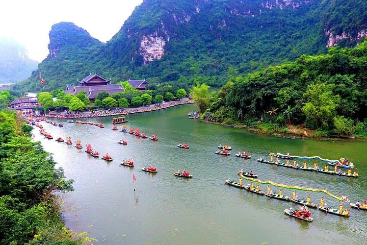 Trang An & Hoa Lu Day Tour from Hanoi — Boat Caves, Biking & Ancient Capital