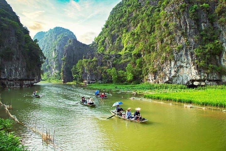 Trang An & Hoa Lu Day Tour from Hanoi — Boat Caves, Biking & Ancient Capital photo 3