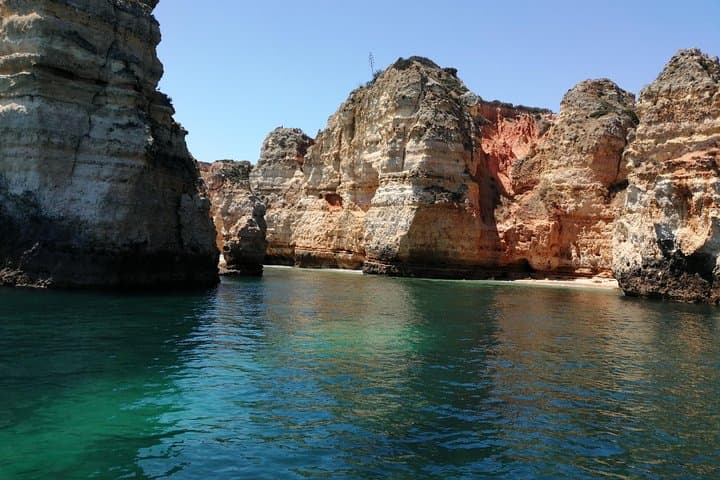 Full-Day Private Yacht Charter from Lagos: Tapas, Paddleboarding & Coastal Caves photo 4
