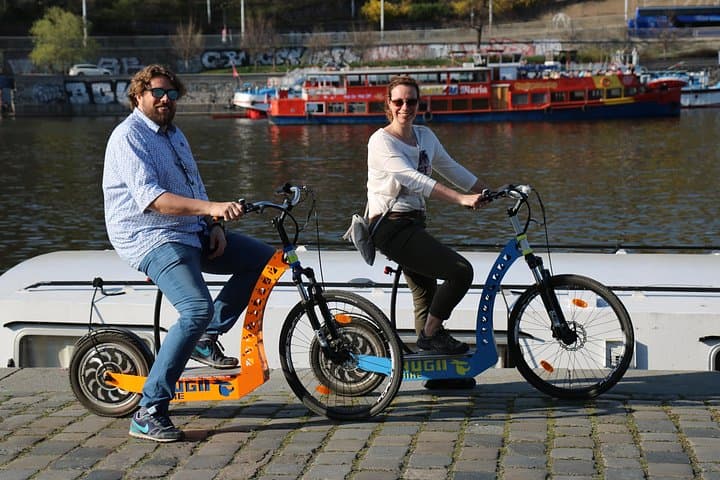 Grand City Tour of Prague on Cruiser e-Bikes and e-Scooters