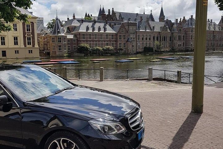 Delft, The Hague & Kinderdijk Day Tour from Amsterdam: Windmills, Mauritshuis & Delft Blue photo 2