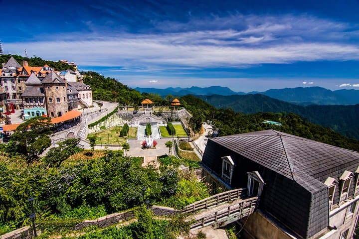 Ba Na Hills & Golden Bridge Day Tour — Cable Car, French Village & Panoramas photo 6