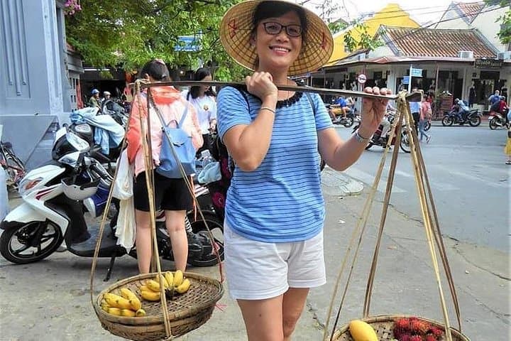 Hoi An Walking Tour and Cam Kim Island Boat + Bicycle Experience photo 4