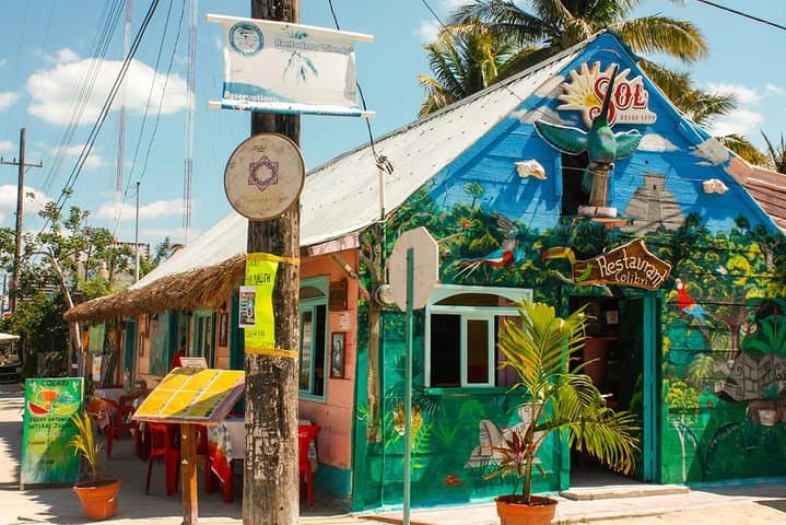 Holbox Day Trip from Cancun: Boat to Cenotes, Passion Island & Beach Bikes