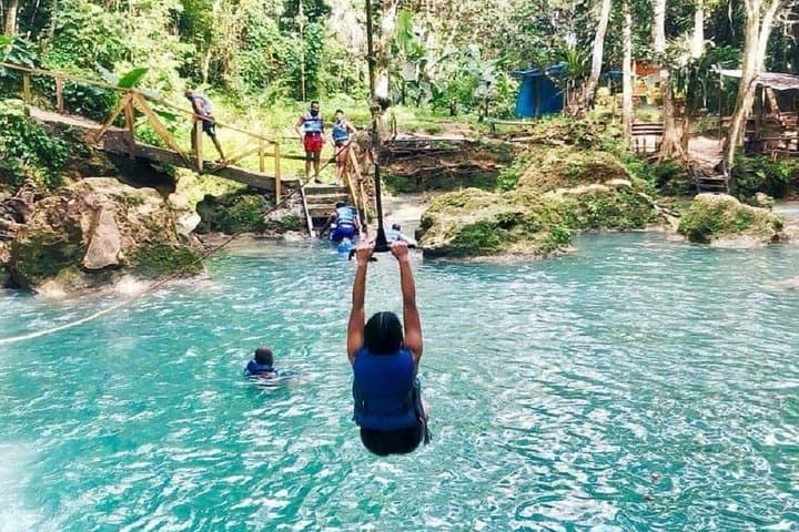 Climb, Swim, Repeat: Dunn's River Falls and Irie Blue Hole Adventure from Montego Bay