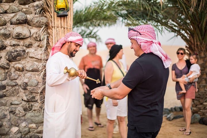 Dubai Desert Camel Safari & Emirati Dinner: Sunset Dunes, Falconry, and Bedouin Camp photo 5