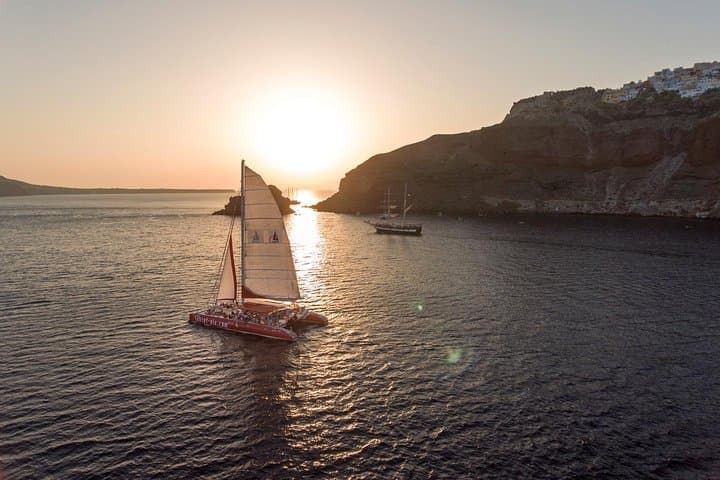Santorini Sunset Cruise: Swim Red & White Beaches with Hot Springs Mud Bath photo 3
