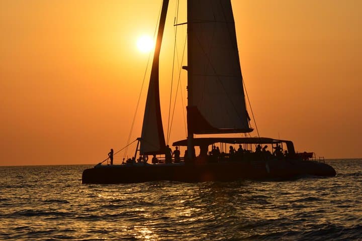 Santorini Sunset Cruise: Swim Red & White Beaches with Hot Springs Mud Bath photo 2