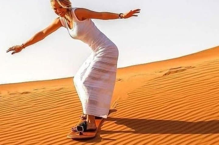 Dubai Evening Desert Safari: Sandboarding, Camel Rides and BBQ Under the Dunes photo 4