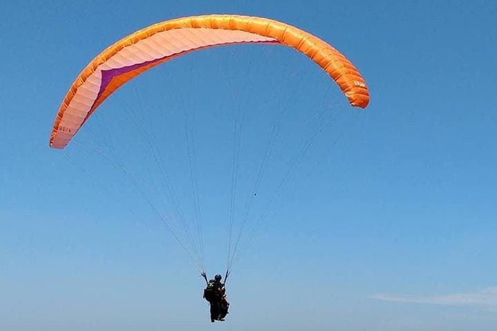 Soaring Above Paradise: Bali's Exhilarating Paragliding Adventure photo 2