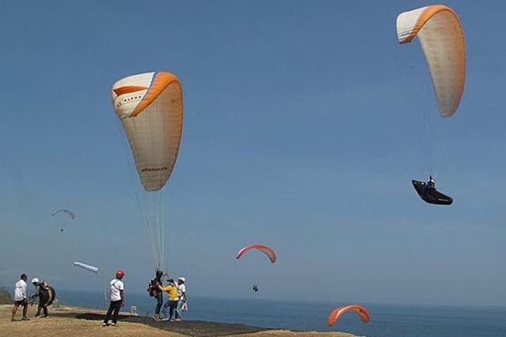 Soaring Above Paradise: Bali's Exhilarating Paragliding Adventure photo 4