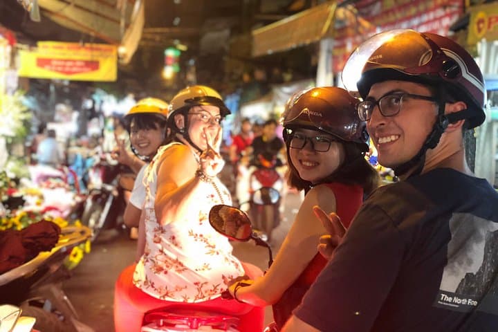 Saigon Night Scooter Food Tour: 7-District Street Food Adventure photo 1