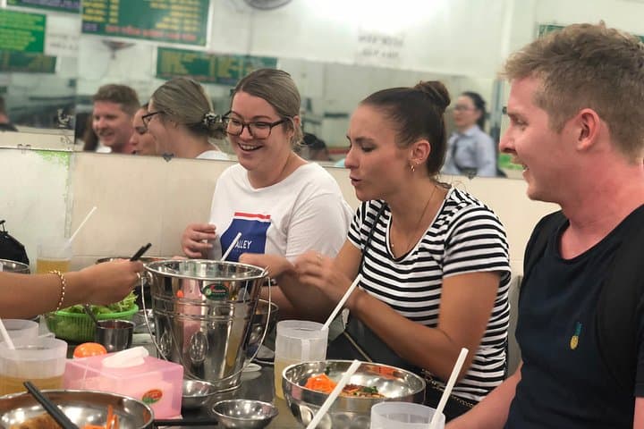 Saigon Night Scooter Food Tour: 7-District Street Food Adventure photo 3