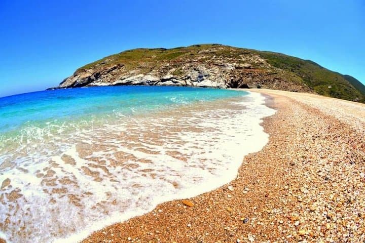 Discover Zorkos Beach: Crystal Waters and Golden Sands on Andros Island